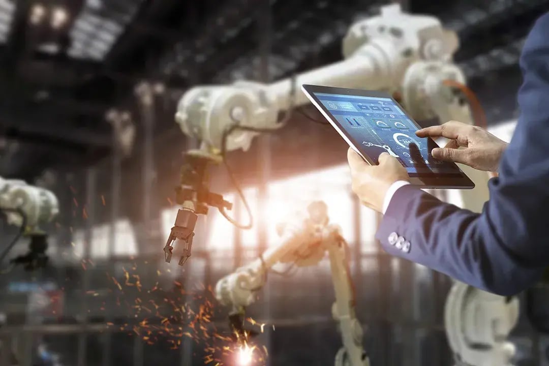 engineer-using-tablet-check-control-automation-robot-arms-machine (1)