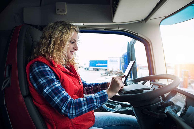 truck-driver-using-mobile-device