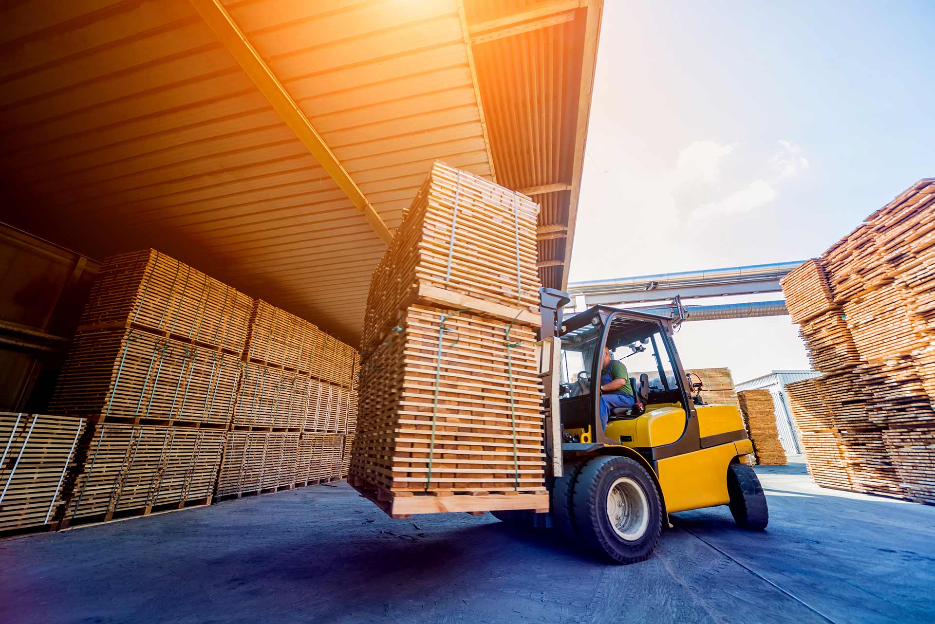 A package forklift lifts package into the warehouse